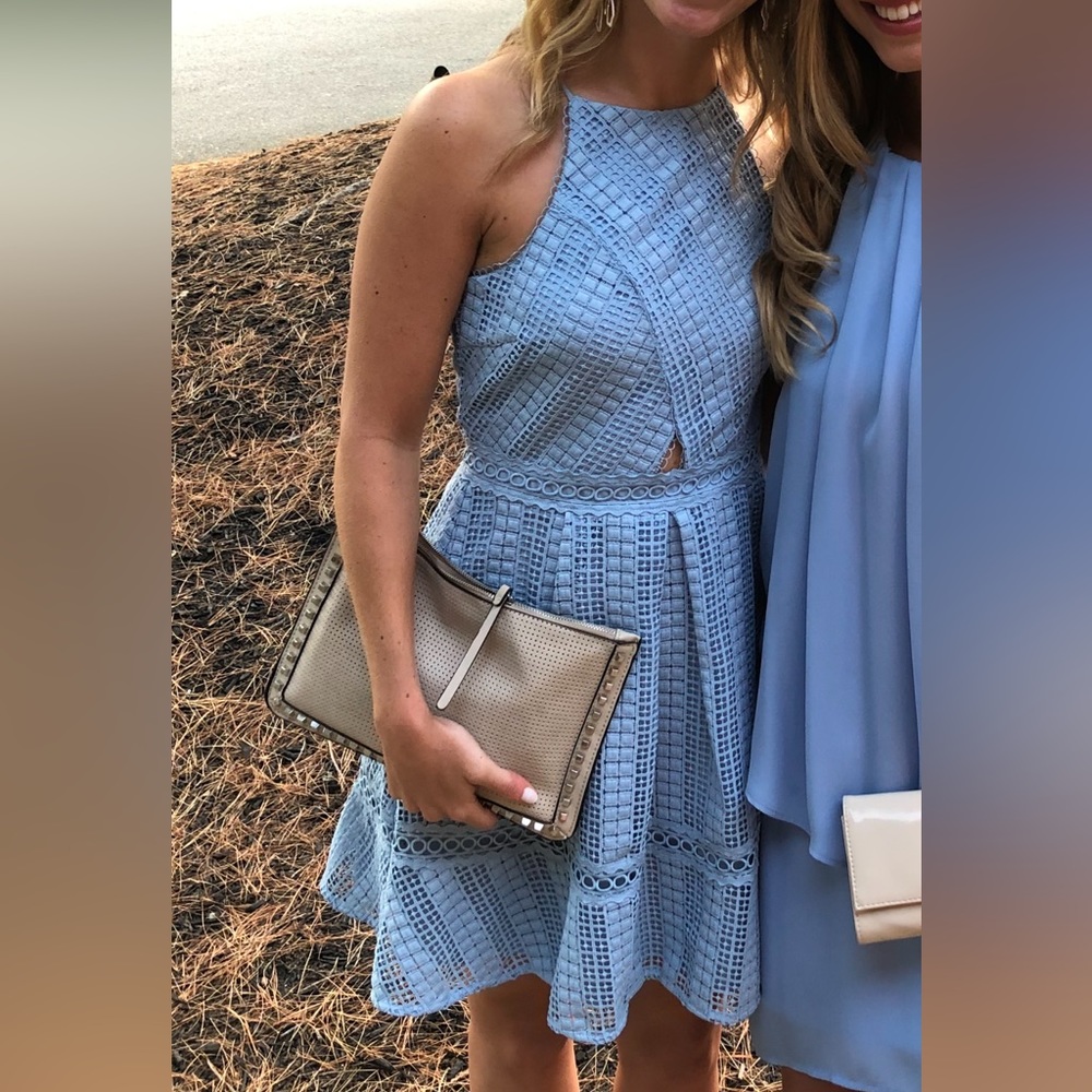 Baby blue mini dress with lace detail and small cut out. Worn once